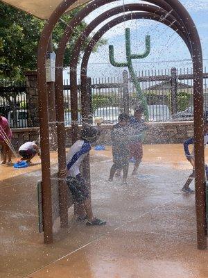 My son in the Water splash