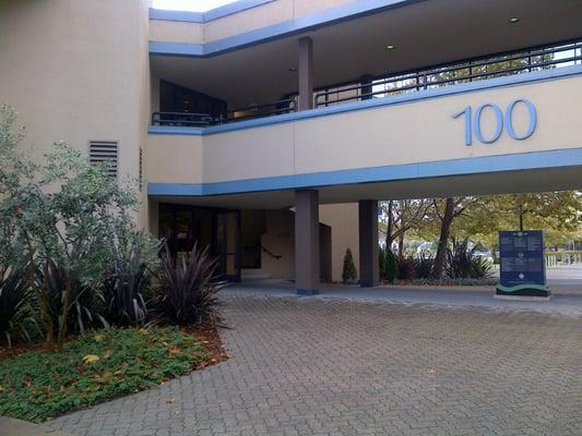 Office is located in the building on the left, bottom floor, first door on the right.