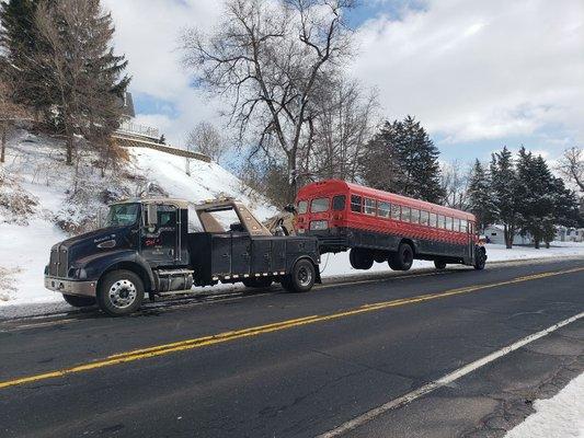 16 ton towing a school bus