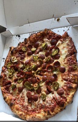 Pepperoni and jalapeño pizza