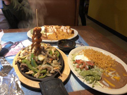 Chicken Tostada served with rice and beans + Fajita sampler (steak, chicken & shrimp).