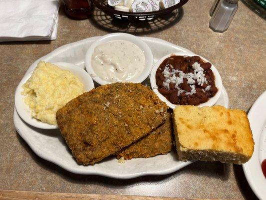 Country fried steak, cheese grits and red beans n rice