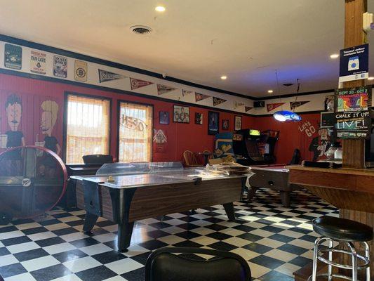 Air hockey, billiards, and arcade games