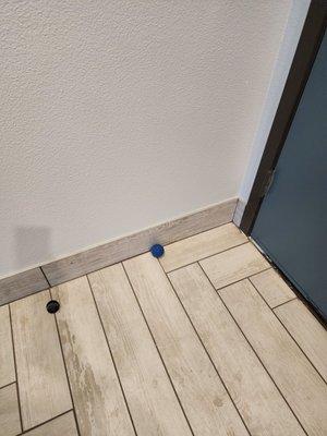 Ball left behind door in 2nd floor room. We do not have any pets.