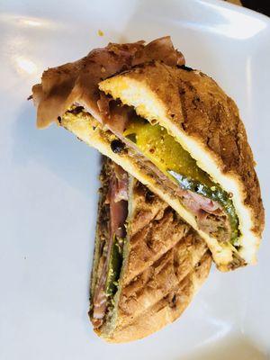 Experience a taste of Cuba with every bite of this mouth-watering Cuban sandwich.