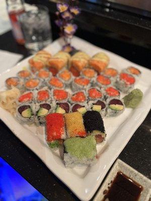 Back to front American Dream Roll , Spicy Salmon, Spicy Tuna, Tuna and Avocado Roll, Diamond Roll