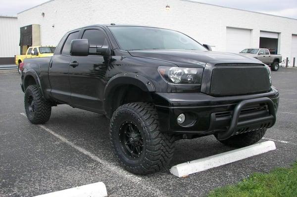 Toyota 4WD offroad package with brush guard, suspension lift kit