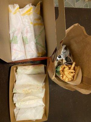 Fiesta Pack - 6 chicken soft tacos, 6 bean and cheese burritos (half green and half red sauce).  Large Fries Extra Del Scorcho