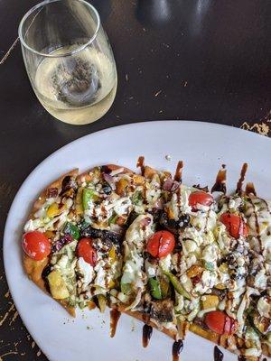 Roasted veggie flatbread & ice cold Pinot Gris