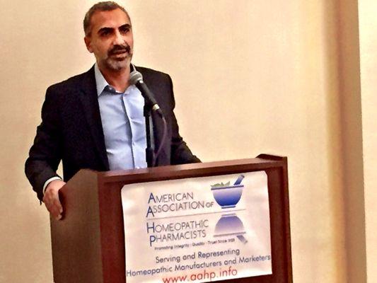 Dr. Payam Hakimi, the keynote speaker at Health Expo West addressing the American Association of Homeopathic Pharmacies