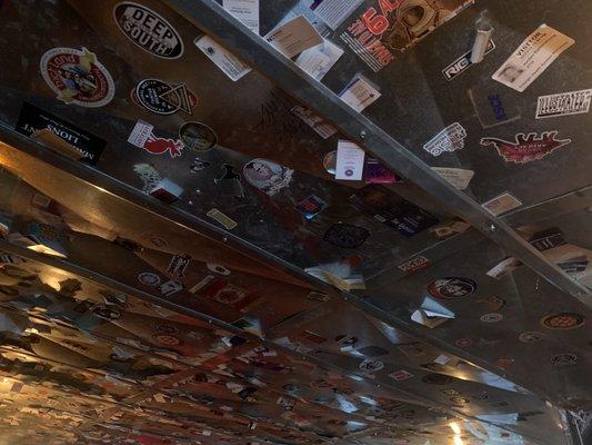 People stick their business cards in the ceiling. I thought this was really cool and unique!