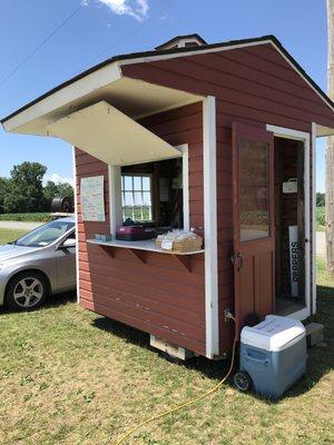 Little booth out by the berry field - you pay here