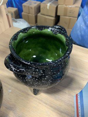 After being fired-- used the black speckled paint and a glittery dark green on the inside