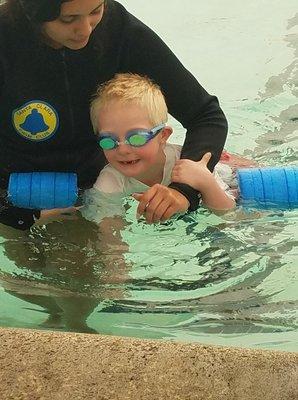 Happy swimmer on his first day of swim class with Coach Anna :)