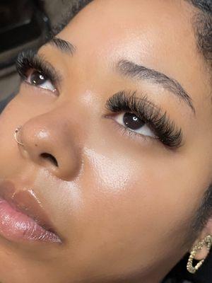 Eyelash Extensions is a unique, eye-catching design that maintains the full, fluffy volume while adding a touch of creativity and flair.