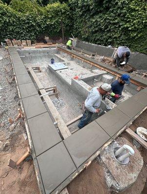 Poured in place concrete pool coping