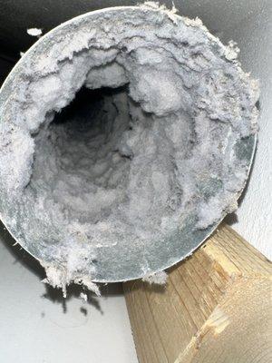 Blocked dryer pipe. Pipe is full of lint.