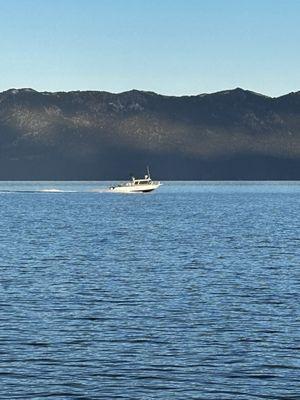 Boat going across the lake