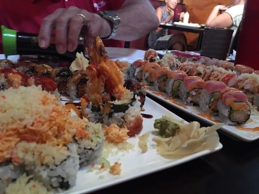 Family style order. Yummy Roll, Firecracker Roll, and more yumminess. Get in my mouth already!