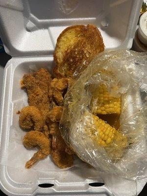 1 fish and 9 shrimp with a side of corn