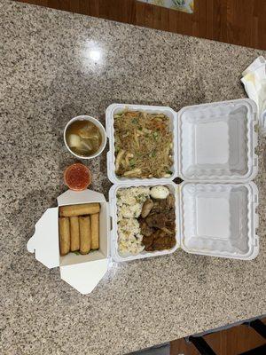 Pancit w/ 5 pc Lumpia & Pork menudo, Adobo chicken served with garlic rice and a side of soup