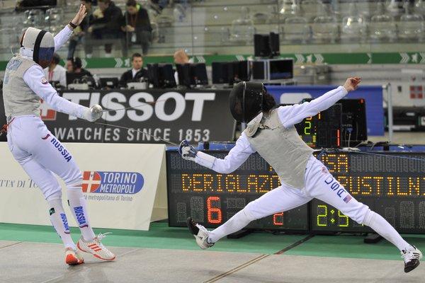 Team Touche student fencing against a World No. 1 women's foil fencer in Italy at 2019 Grand Prix in Turin, Italy.