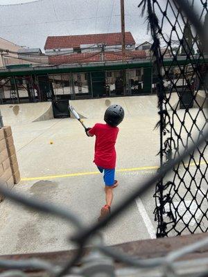 DJ taking batting practice.