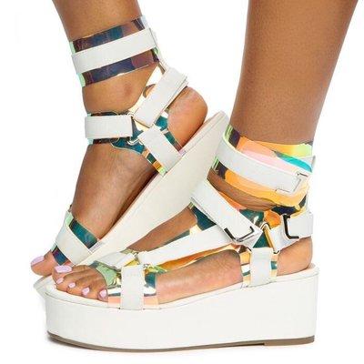 COME GET THESE FLATFORM HARNESS STRAP SANDALS AT DIJIONS BOUTIQUE!!