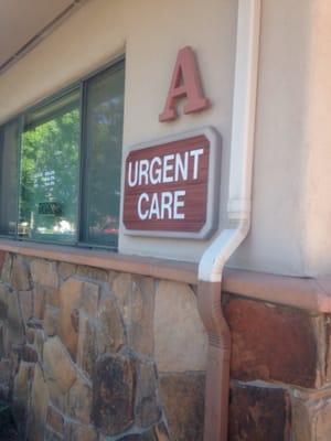 Sign out front of Urgent Care, plenty of parking