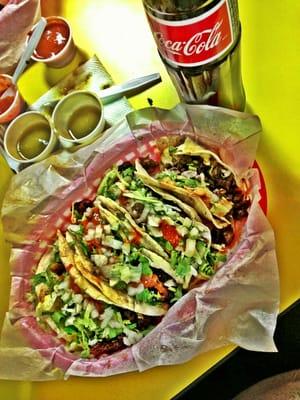 The steak tacos are amazing! Try them with a Mexican coca cola! Your taste buds will thank you!