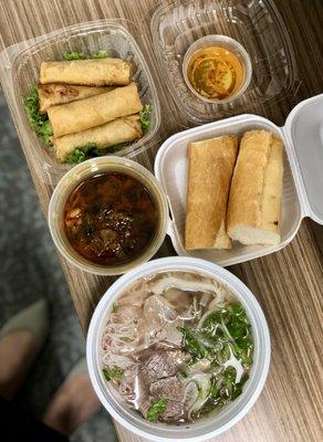 Combination pho, spicy bone marrow, egg rolls.