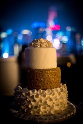 June 2018 Wedding.  Vanilla Cake, Raspberry Filling with White Chocolate Buttercream.  Covered in Fondant.