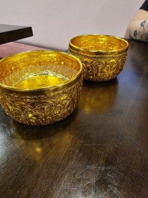 Water served in these gold bowls