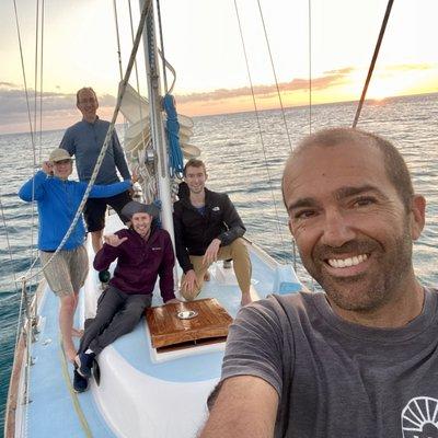 Here we all are at sunset, anchored in Pokai Bay.