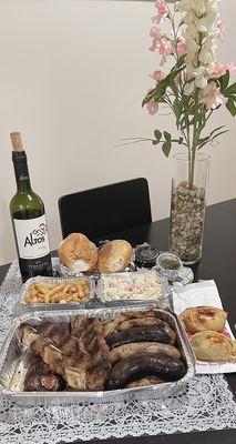 Mixed grill for two $68.89 on UberEATS. Lavish selection of meats & two sides. We added 2 empanadas. Don't forget the Argentinian Malbec.