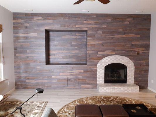 New Tile Floor, Decorative Fire Place and Entire Wall with TV Nook