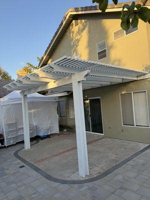 After, aluminum patio cover.