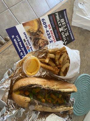 Sweet pepper cheesesteak with sharp provolone & Old Bay fries with cheese