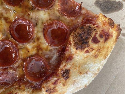 Pepperoni pizza with a hot honey drizzle.