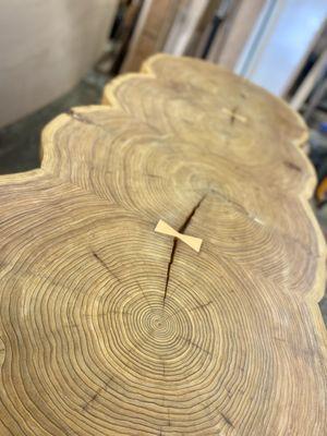 Custom cedar slab cookie outdoor table