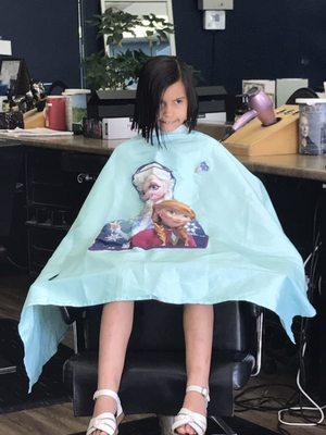 After cut. Bob style. She loved her Elsa smock. Thanks Graciela!