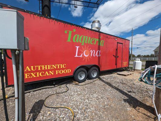 Truck no gallons of lard stacked outside like other taco trucks.