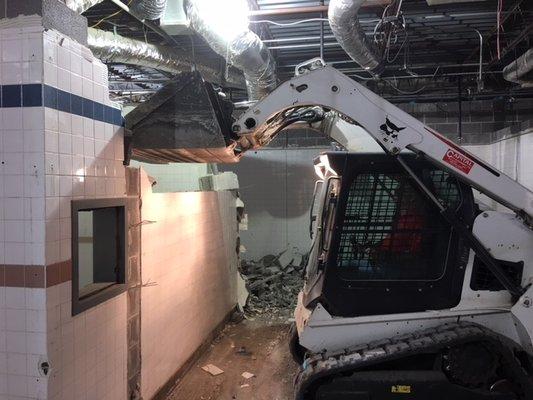 Demo day! Tearing out kitchen walls to make way for classrooms.