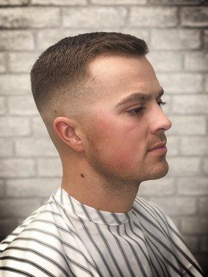 Mid/low bald fade