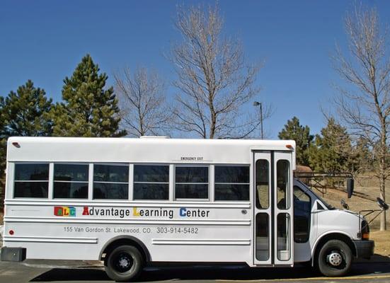 Activity bus with built-in car seats.