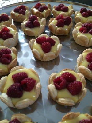 Lemon Tarts with fresh lemon curd, hand made crust and fresh raspberries