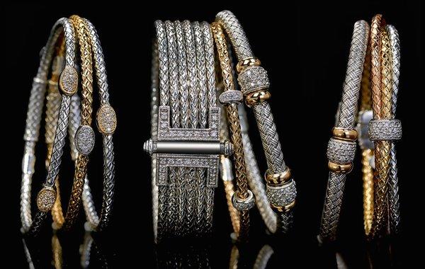 Fine Italian silver mixed with yellow gold and round brilliant diamonds. Stylish bangle bracelets.