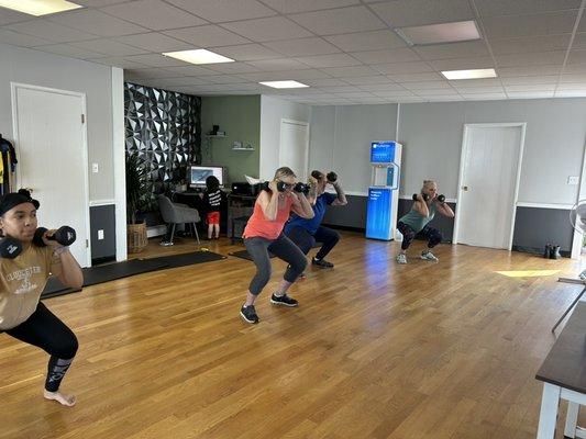 Small Group Strength doing some front rack squats!