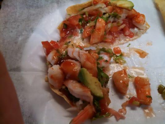 Shrimp tostada wow the shrimp cooked perfect, fresh cilantro tomatoes  etc... Wo derful. I will come back to try something else