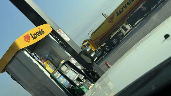 Filling up the tanks while we get gas. On a road trip with the family from Cali to New Orleans